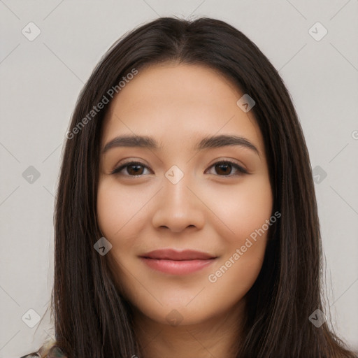 Joyful latino young-adult female with long  brown hair and brown eyes