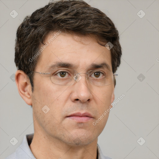 Neutral white adult male with short  brown hair and brown eyes