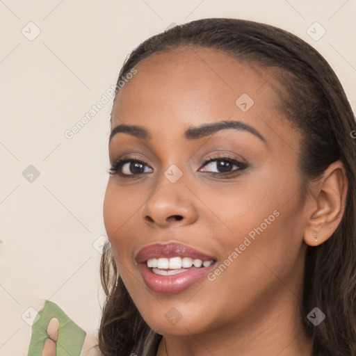 Joyful white young-adult female with long  brown hair and brown eyes