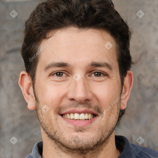 Joyful white adult male with short  brown hair and brown eyes