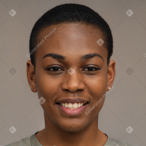 Joyful black young-adult female with short  black hair and brown eyes