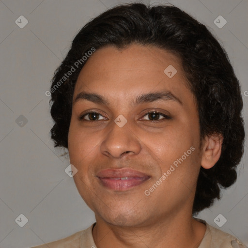 Joyful latino adult female with short  brown hair and brown eyes