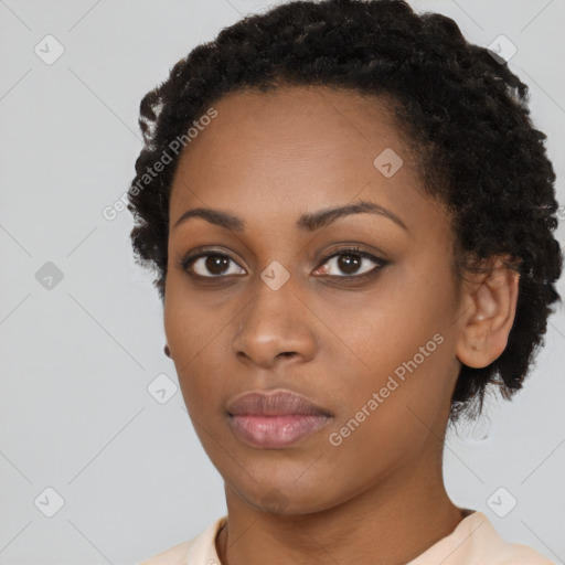 Neutral black young-adult female with short  black hair and brown eyes