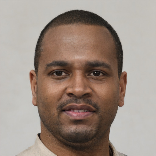 Neutral black young-adult male with short  black hair and brown eyes