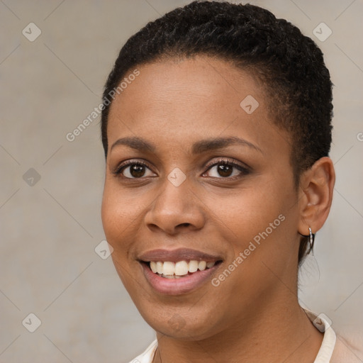 Joyful black young-adult female with short  brown hair and brown eyes