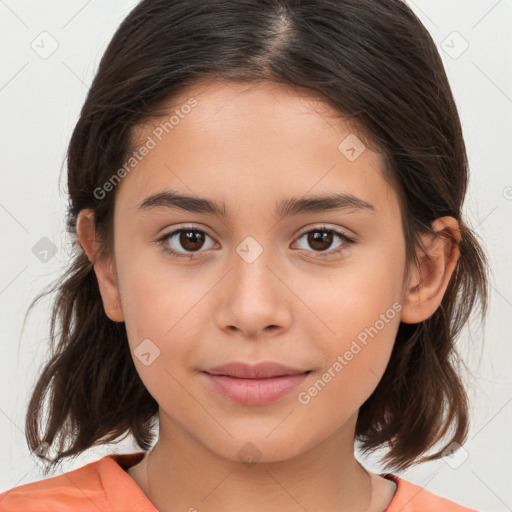 Joyful white child female with medium  brown hair and brown eyes