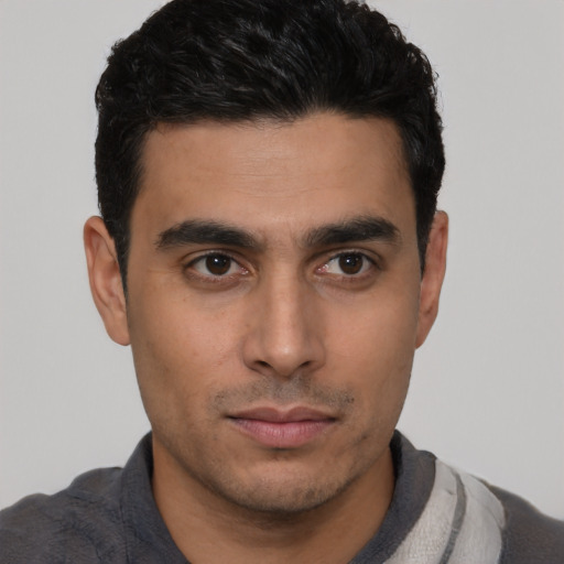Neutral white young-adult male with short  black hair and brown eyes