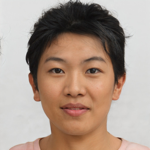 Joyful asian young-adult female with short  black hair and brown eyes