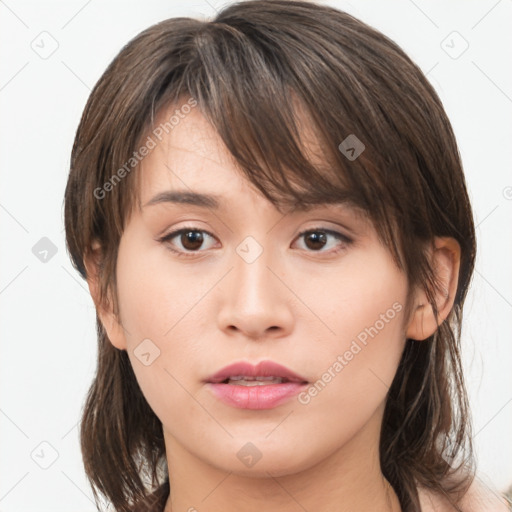 Neutral white young-adult female with medium  brown hair and brown eyes