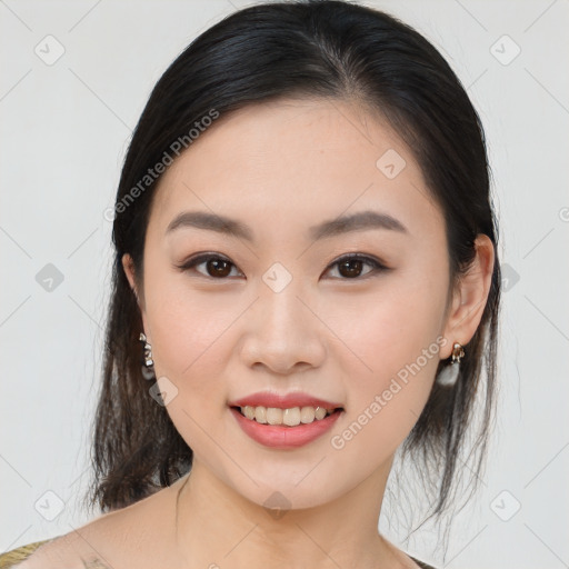 Joyful asian young-adult female with medium  brown hair and brown eyes