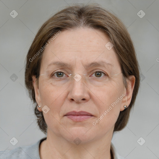 Joyful white adult female with medium  brown hair and grey eyes