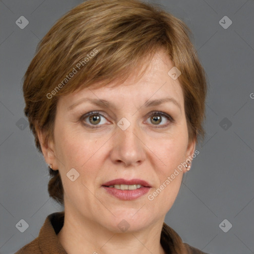 Joyful white adult female with medium  brown hair and grey eyes