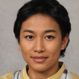 Joyful asian young-adult female with short  black hair and brown eyes