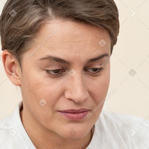 Joyful white adult female with short  brown hair and brown eyes