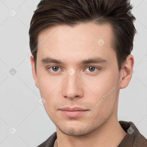 Neutral white young-adult male with short  brown hair and brown eyes