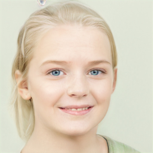 Joyful white child female with short  blond hair and blue eyes