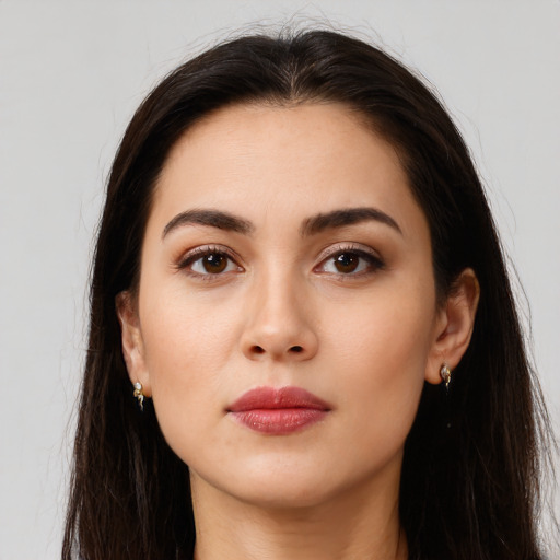 Neutral white young-adult female with long  brown hair and brown eyes