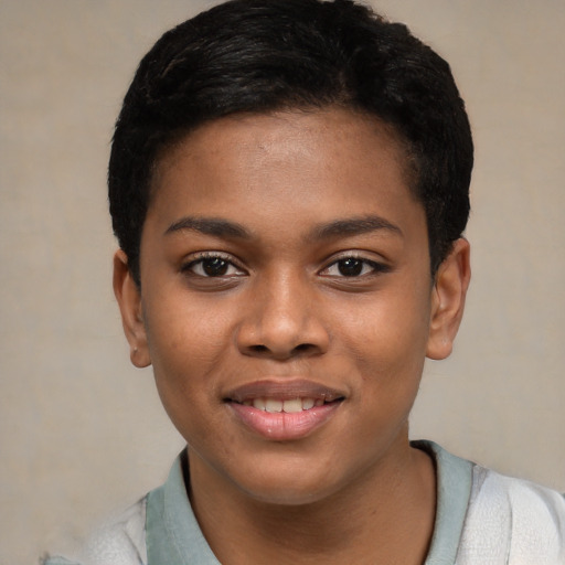 Joyful black young-adult female with short  black hair and brown eyes