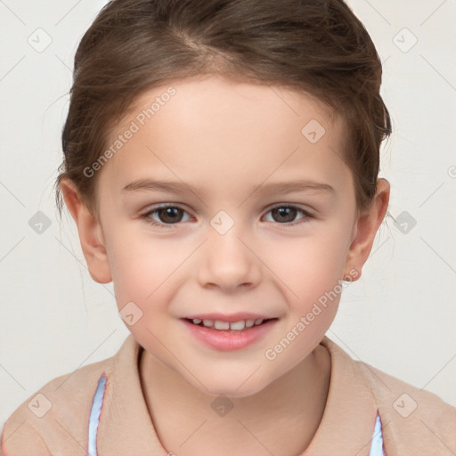 Joyful white child female with short  brown hair and brown eyes