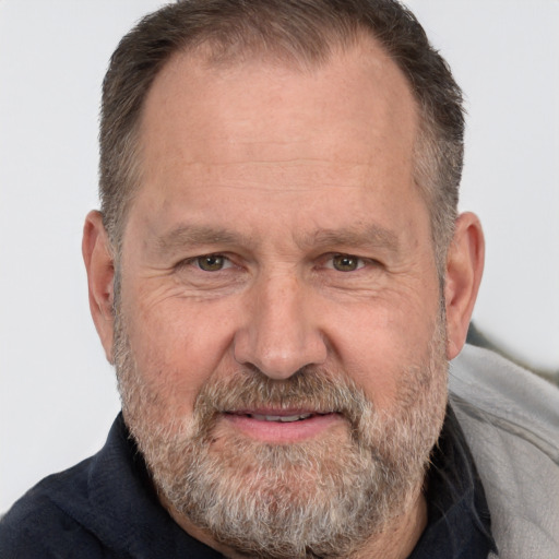 Joyful white middle-aged male with short  brown hair and brown eyes