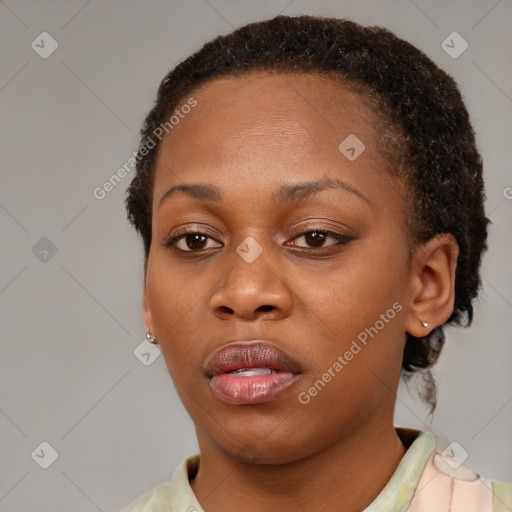 Neutral black young-adult female with short  brown hair and brown eyes