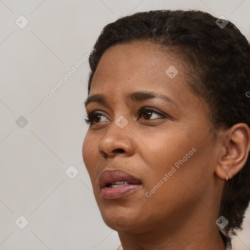 Neutral black young-adult female with short  black hair and brown eyes