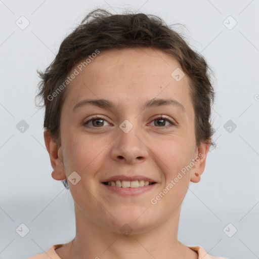 Joyful white young-adult female with short  brown hair and grey eyes