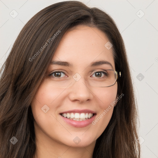 Joyful white young-adult female with long  brown hair and green eyes