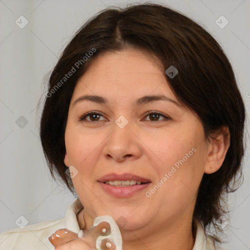 Joyful white adult female with medium  brown hair and brown eyes