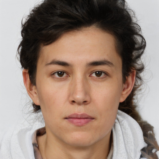 Neutral white young-adult female with short  brown hair and brown eyes