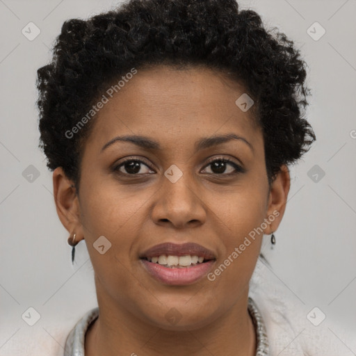 Joyful black young-adult female with short  brown hair and brown eyes