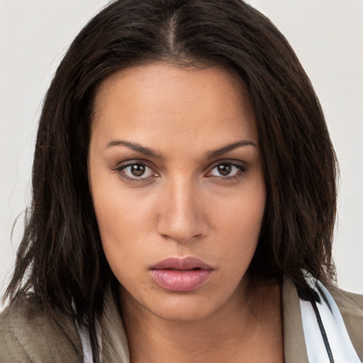 Neutral white young-adult female with long  brown hair and brown eyes