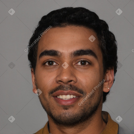 Joyful latino young-adult male with short  black hair and brown eyes