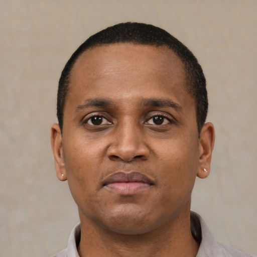 Neutral black young-adult male with short  black hair and brown eyes