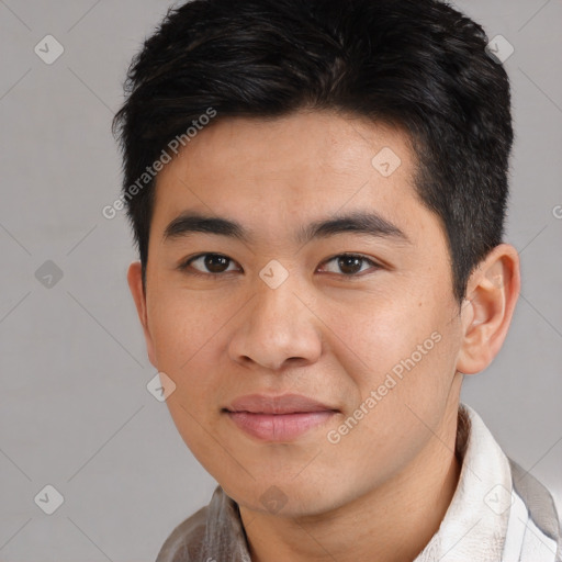 Joyful asian young-adult male with short  black hair and brown eyes