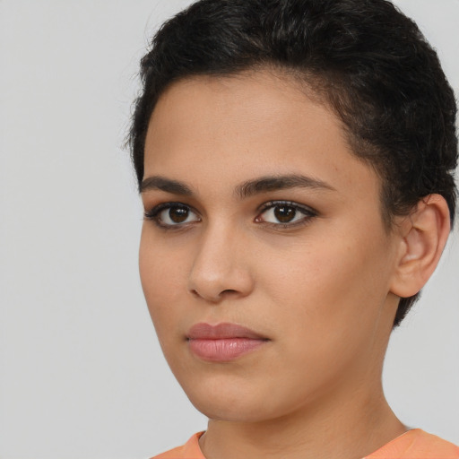 Neutral latino young-adult female with short  brown hair and brown eyes