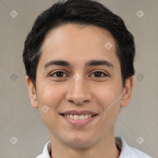 Joyful white young-adult male with short  black hair and brown eyes