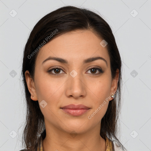 Joyful latino young-adult female with long  brown hair and brown eyes