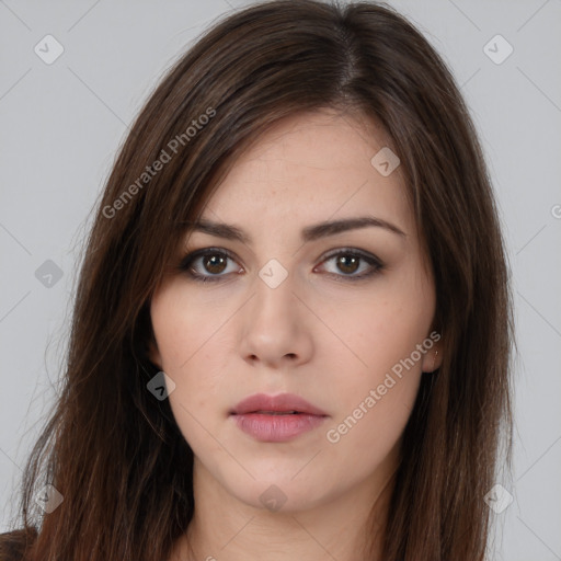 Neutral white young-adult female with long  brown hair and brown eyes