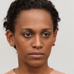 Neutral black young-adult female with short  brown hair and brown eyes