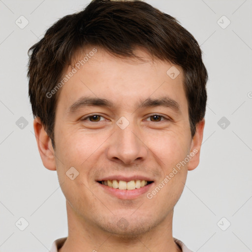 Joyful white young-adult male with short  brown hair and brown eyes