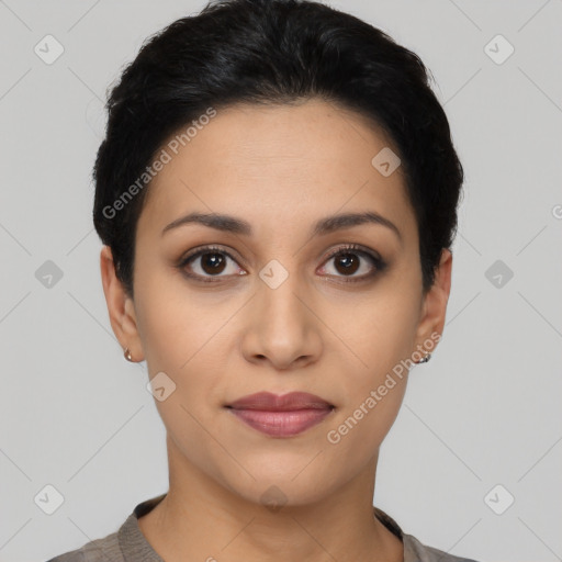 Joyful latino young-adult female with short  black hair and brown eyes