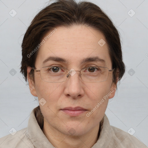 Joyful white adult female with short  brown hair and brown eyes