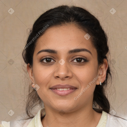 Joyful latino young-adult female with medium  brown hair and brown eyes