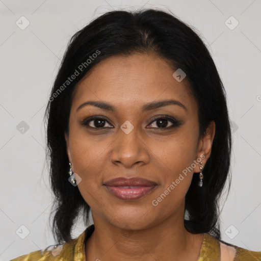 Joyful black young-adult female with medium  brown hair and brown eyes