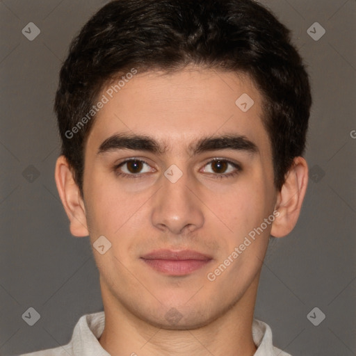 Joyful latino young-adult male with short  brown hair and brown eyes