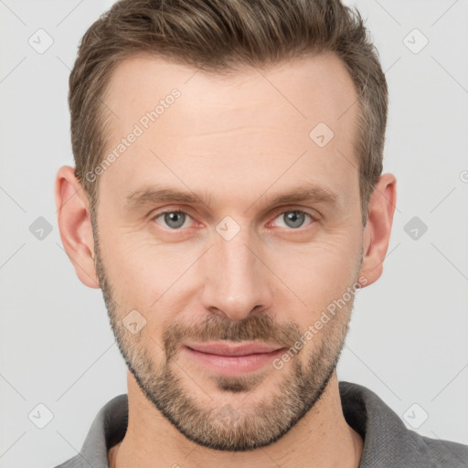 Joyful white adult male with short  brown hair and grey eyes