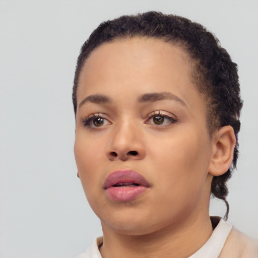 Neutral white young-adult female with short  black hair and brown eyes