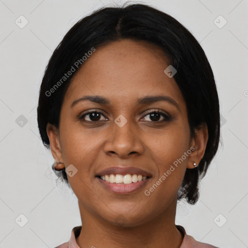 Joyful black young-adult female with medium  black hair and brown eyes