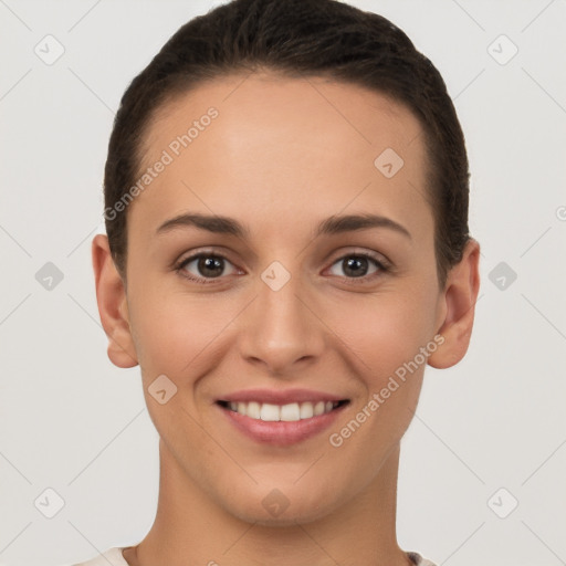 Joyful white young-adult female with short  brown hair and brown eyes